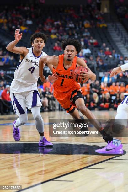 Oregon State guard Stephen Thompson Jr. Drives to the basket during the first round game of the mens Pac-12 Tournament between the Washington Huskies...