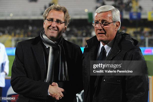 Italy head coach Marcello Lippi and Sweden head coach Erik Hamrén of Sweden poses for photographers during the international friendly match between...