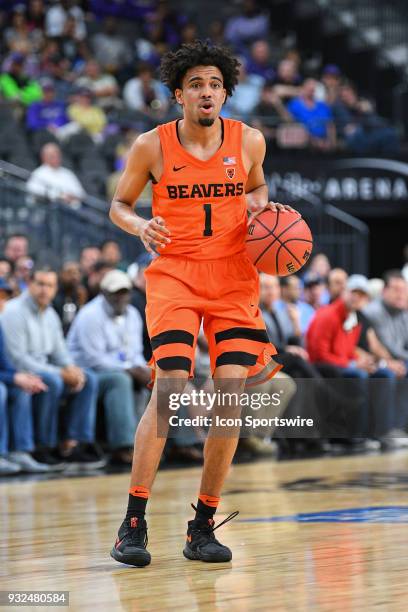 Oregon State guard Stephen Thompson Jr. Sets up the offense during the first round game of the mens Pac-12 Tournament between the Washington Huskies...