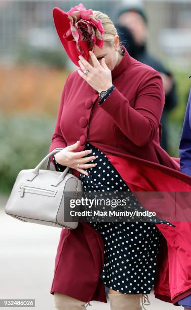 Zara Phillips attends day 2 'Ladies Day' of the Cheltenham Festival at Cheltenham Racecourse on March 14, 2018 in Cheltenham, England. Zara Phillips