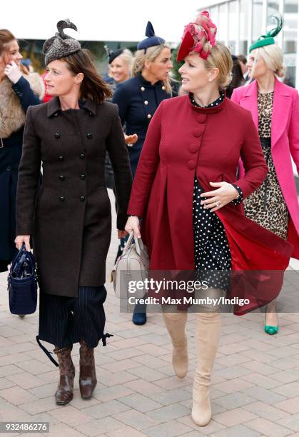 Dolly Maude and Zara Phillips attend day 2 'Ladies Day' of the Cheltenham Festival at Cheltenham Racecourse on March 14, 2018 in Cheltenham, England.