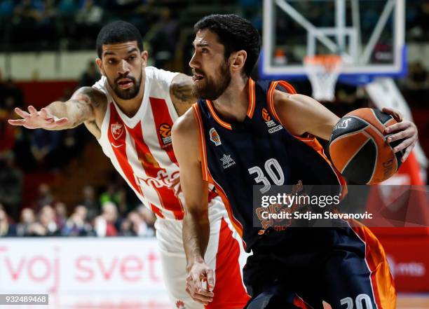 Joan Sastre of Valncia in action against James Feldeine of Crvena Zvezda during the 2017/2018 Turkish Airlines EuroLeague Regular Season game between...