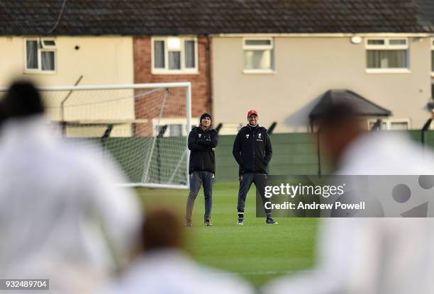 Jurgen Klopp manager of Liverpool and Zeljko Buvac First assistant coach of Liverpool during the training session at Melwood Training Ground on March...