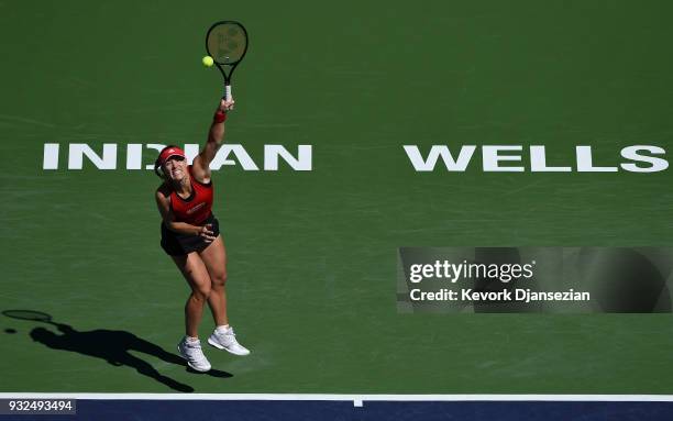 Angelique Kerber of Germany serves against Daria Kasatkina of Russia during Day 9 of BNP Paribas Open on March 15, 2018 in Indian Wells, California.