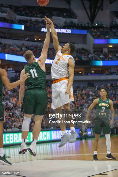 Grant Williams of the Tennessee Volunteers shoots the ball during the NCAA Div I Men's Championship First Round basketball game between the Tennessee...