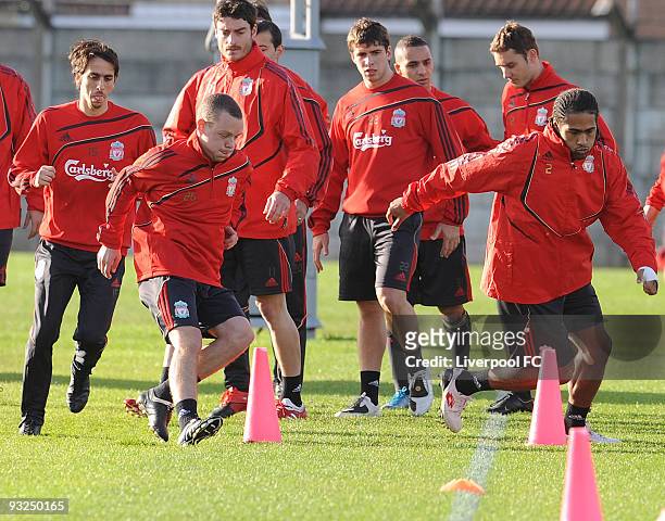 Glen Johnson and Jay Spearing of Liverpool in action during a training session on November 20, 2009 in Liverpool, England.