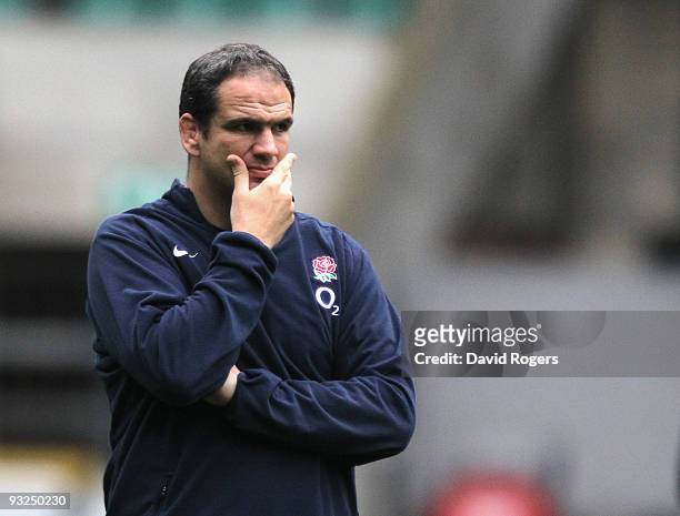Martin Johnson, the England head coach, watches his team during the England training session held at Twickenham Stadium on November 20, 2009 in...
