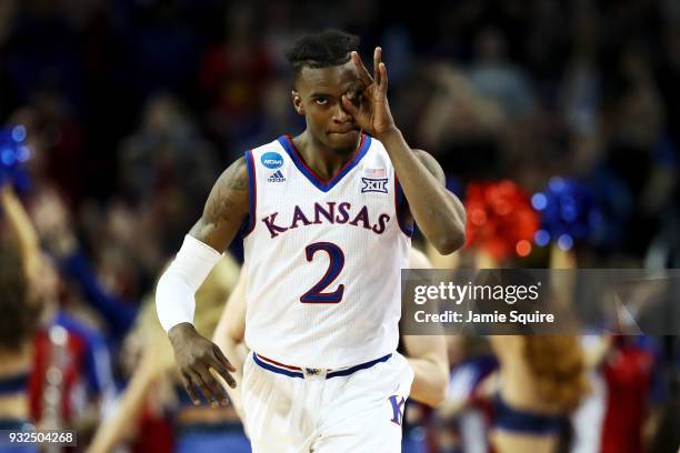 Lagerald Vick of the Kansas Jayhawks reacts after making a three point shot in the second half against the Pennsylvania Quakers during the first...