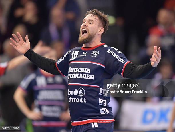 Thomas Morgensen of Flensburg celebrates during the DKB Bundesliga Handball match between SG Flensburg-Handewitt and Fuechse Berlin at Flens-Arena on...