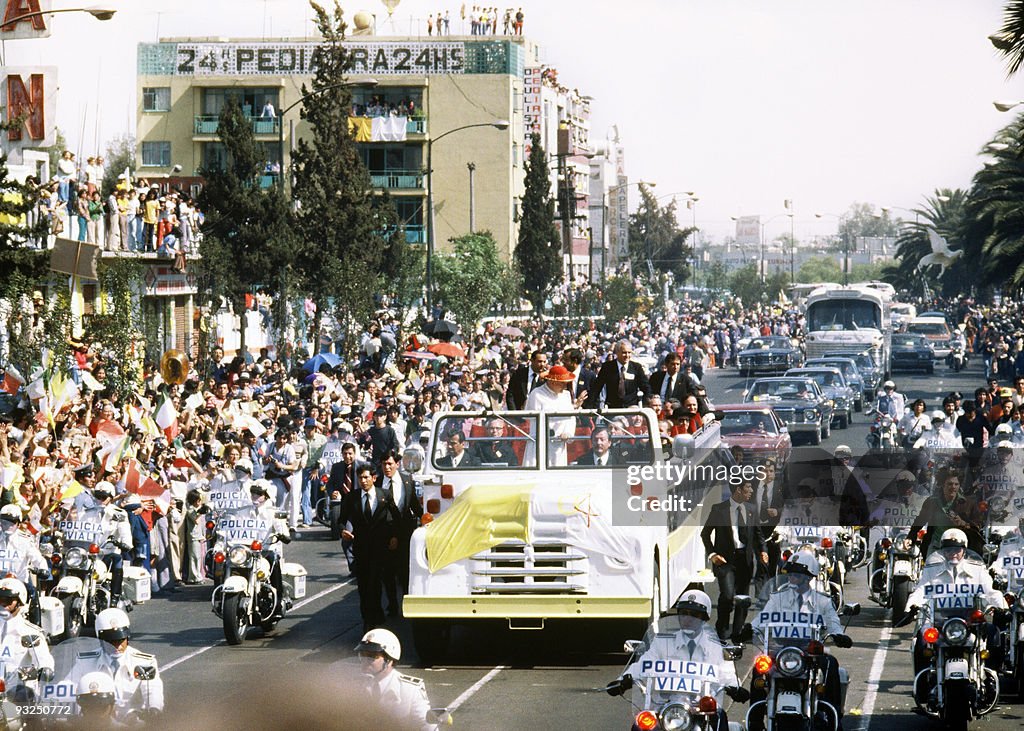 Pope John Paul II waves from his popemob