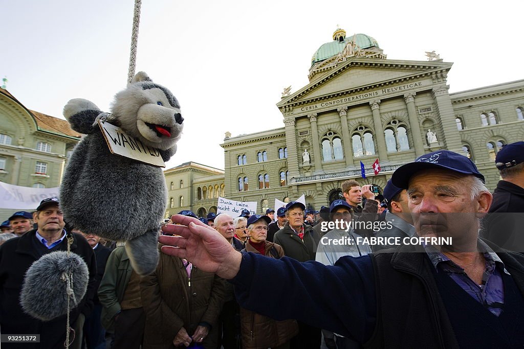 A man touches a soft toy representing a