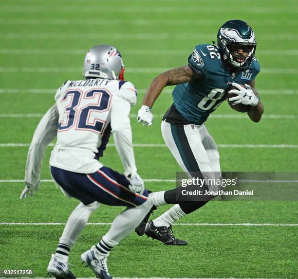 Devin McCourty of the New England Patriots chases Torrey Smith of the Philadelphia Eagles during Super Bowl Lll at U.S. Bank Stadium on February 4,...