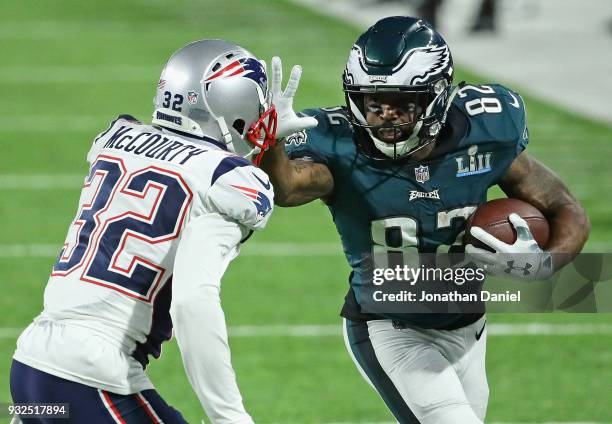 Devin McCourty of the New England Patriots chases Torrey Smith of the Philadelphia Eagles during Super Bowl Lll at U.S. Bank Stadium on February 4,...