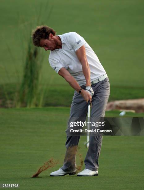 Chris Wood of England plays his third shot at the 18th hole during the second round of the Dubai World Championship, on the Earth Course, Jumeirah...