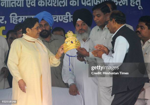 Leaders from Himachal, Punjab, Haryana and Jammu Kashmir gifted golden crown to BSP Supremo Mayawati during the rally in Sector 25 on the occasion of...