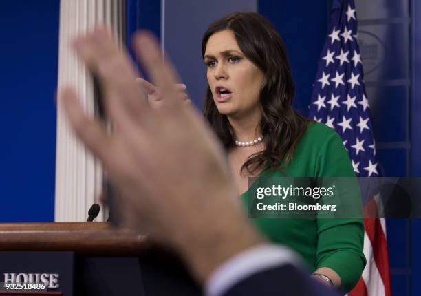 Sarah Huckabee Sanders, White House press secretary, takes a question during a press conference at the White House briefing room in Washington, D.C.,...