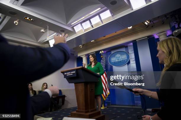 Sarah Huckabee Sanders, White House press secretary, takes a question during a press conference at the White House briefing room in Washington, D.C.,...