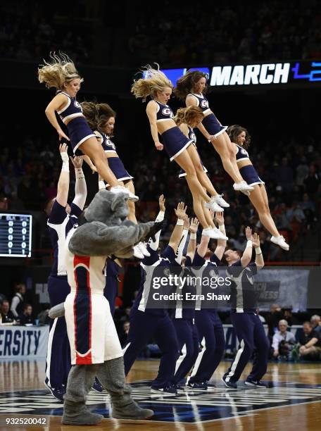 Gonzaga Bulldogs cheerleaders perform during the first round game between the UNC-Greensboro Spartans and the Gonzaga Bulldogs in the 2018 NCAA Men's...