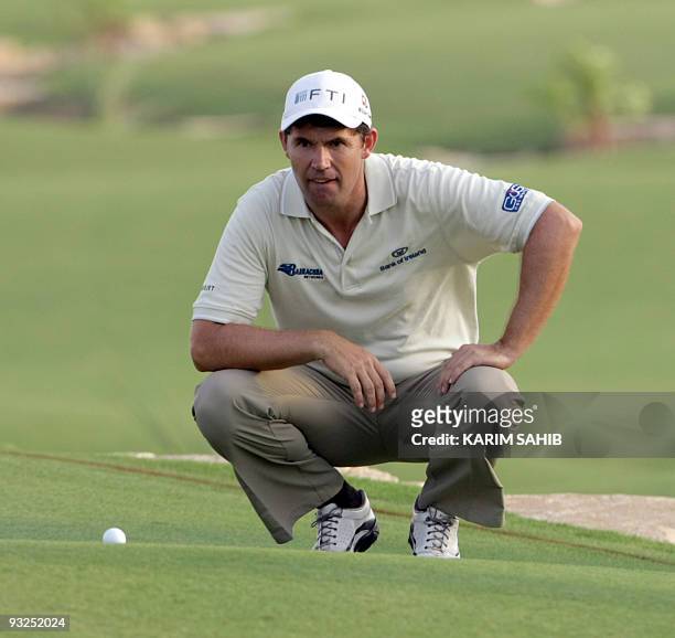 Ireland's Padraig Harrington competes on November 20, 2009 during the second round of the 7.5 million dollars Dubai World Championship, being played...