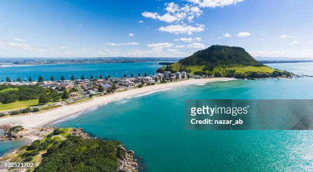 aerial panoramic view of mt maunganui coastline. - new zealand stock pictures, royalty-free photos & images