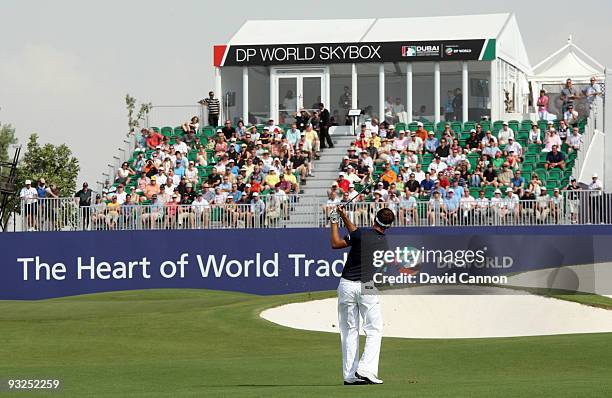 Nick Dougherty of England plays his third shot at the 12th hole during the second round of the Dubai World Championship, on the Earth Course,...