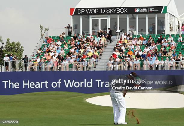 Nick Dougherty of England plays his third shot at the 12th hole during the second round of the Dubai World Championship, on the Earth Course,...