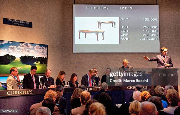 Pair of George III mahogany hall benches attributed to William and John Linnell dated circa 1760 sell for 155,000 GBP at Christie's on November 20,...