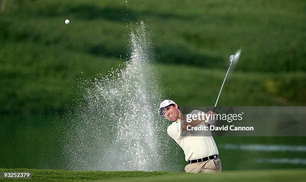 Padraig Harrington of Ireland plays his third shot on the 14th hole during the second round of the Dubai World Championship, on the Earth Course,...