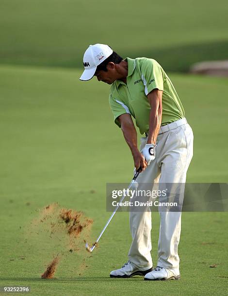 Wen-chong Liang of China plays his third shot at the 18th hole during the second round of the Dubai World Championship, on the Earth Course, Jumeirah...