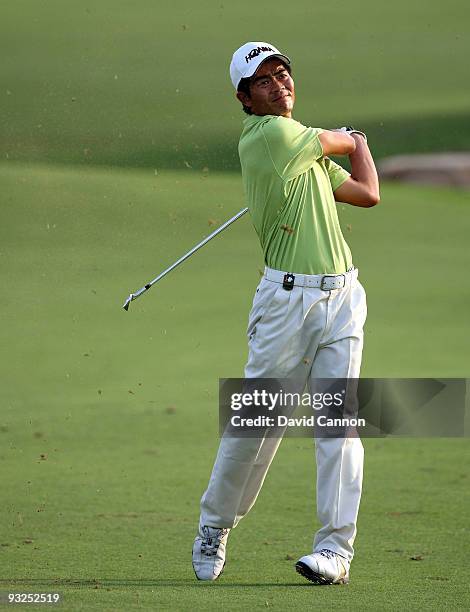 Wen-chong Liang of China plays his third shot at the 18th hole during the second round of the Dubai World Championship, on the Earth Course, Jumeirah...