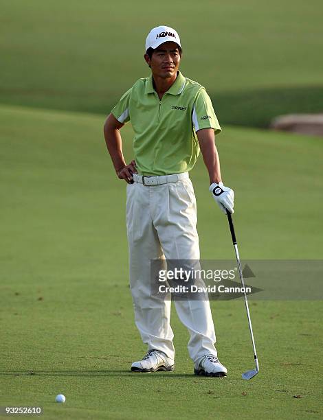 Wen-chong Liang of China plays his third shot at the 18th hole during the second round of the Dubai World Championship, on the Earth Course, Jumeirah...