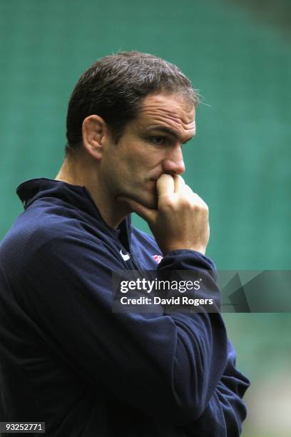 Martin Johnson the England head coach watches his team during the England training session held at Twickenham Stadium on November 20, 2009 in...