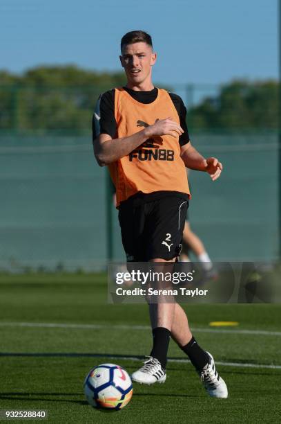 Ciaran Clark passes the ball during the Newcastle United Training Session at Hotel La Finca on March 15 in Alicante, Spain.