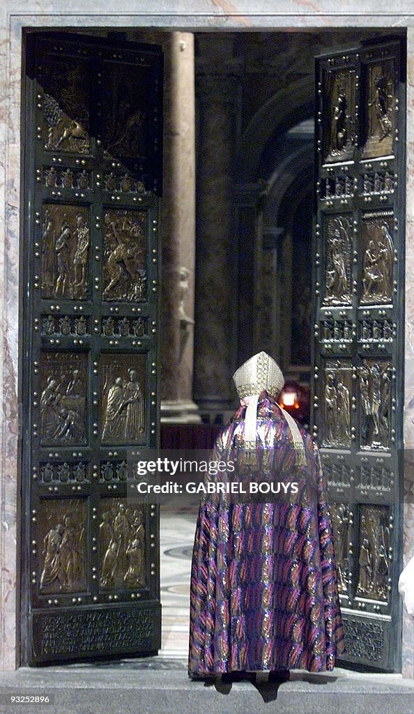 Pope John Paul II unlocks the Holy Door