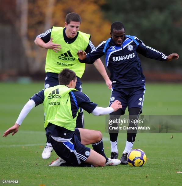 John Terry of Chelsea tried to tackl Gael Kakuta of Chelsea during a training session at Cobham training ground on November 20, 2009 in Cobham,...