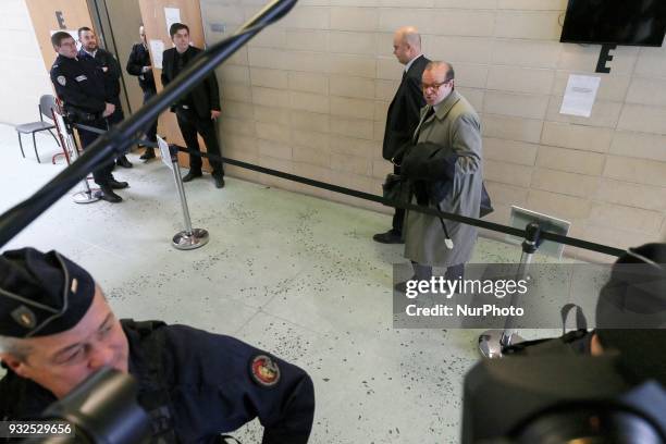 Lawyers for Laura Smet Herve Temime and Emmanuel Ravanas arrive at the entrance of a courtroom in Nanterre on March 15 where the two older children...