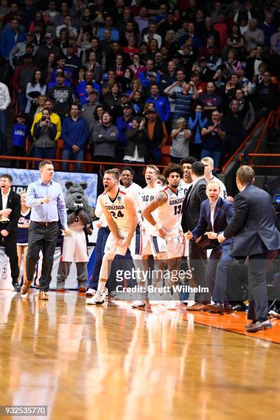 Gonzaga University bench reacts to game win during the 2018 NCAA Photos via Getty Images Men's Basketball Tournament held at Taco Bell Arena on March...