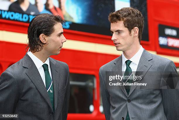 Rafael Nadal of Spain and Andy Murray of Great Britain chat in front of a London Bus during the Barclays ATP World Tour Finals - Media Day at the...