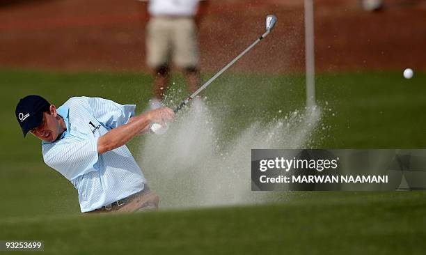 Ireland's Peter Lawrie plays a shot during the second round of the 7.5-million-dollar Dubai World Championship at the 7,675-yard Earth Course at...