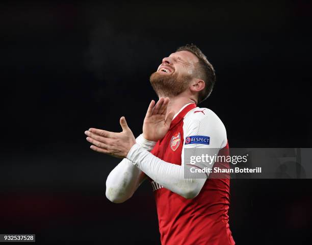 Shkodran Mustafi of Arsenal reacts during the UEFA Europa League Round of 16 Second Leg match between Arsenal and AC Milan at Emirates Stadium on...