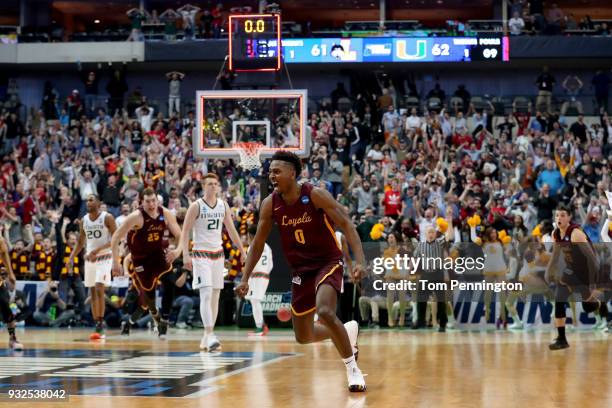 Donte Ingram of the Loyola Ramblers celebrates after his game-winning three pointer against the Miami Hurricanes in the first round of the 2018 NCAA...