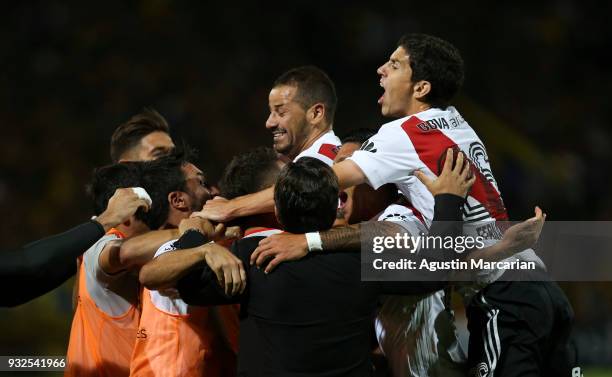 Gonzalo Martinez of River Plate celebrates with teammates after scoring the first goal of his team during the Supercopa Argentina 2018 between River...