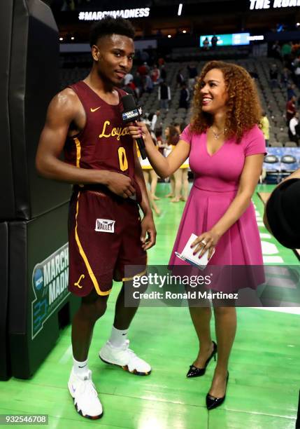 Donte Ingram of the Loyola Ramblers talks with Ros Gold-Onwude after his game-winning three pointer against the Miami Hurricanes in the first round...