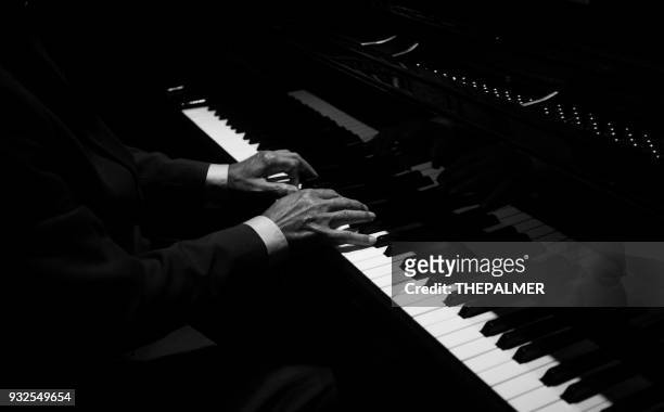 hands playing the piano - piano stock pictures, royalty-free photos & images