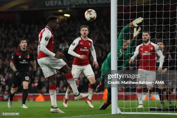 Danny Welbeck of Arsenal scores a goal to make it 3-1 during the UEFA Europa League Round of 16: Second Leg match between Arsenal and AC Milan at...