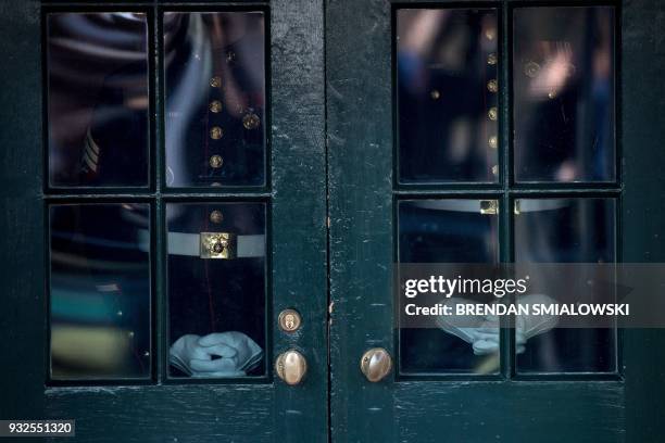 Marines wait to open a door for US President Donald Trump and US first lady Melania Trump to greet Ireland's Prime Minister Leo Varadkar outside the...