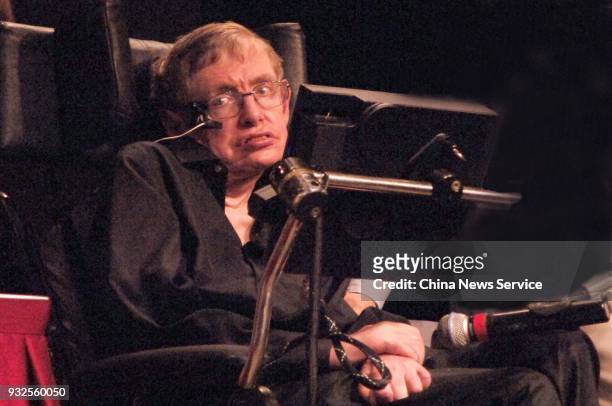 British theoretical physicist Stephen Hawking answers listeners' questions during a science meeting on June 22, 2006 in Beijing, China. Physicist...
