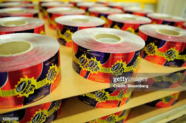 Rolls of wrapper for Cadbury's Creme Egg sit on shelves at the Cadbury Plc factory in Birmingham, U.K., on Friday, Nov. 20, 2009. Cadbury Plc should...