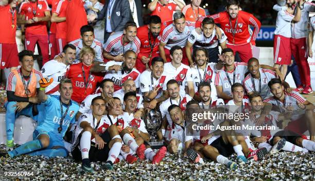 Gonzalo Martinez, Rodrigo Mora of River Plate and teammates celebrate with the Supercopa Argentina 2018 throphy after winning the final match against...