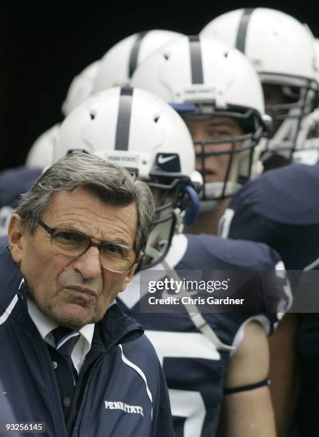 Head coach Joe Paterno of the Penn State Nittany Lions stands in the tunnel with his team against the Indiana Hoosiers at Beaver Stadium on November...